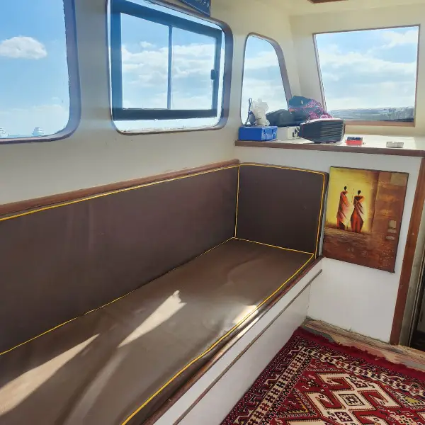 The luxurious and air-conditioned indoor salon of the private boat.