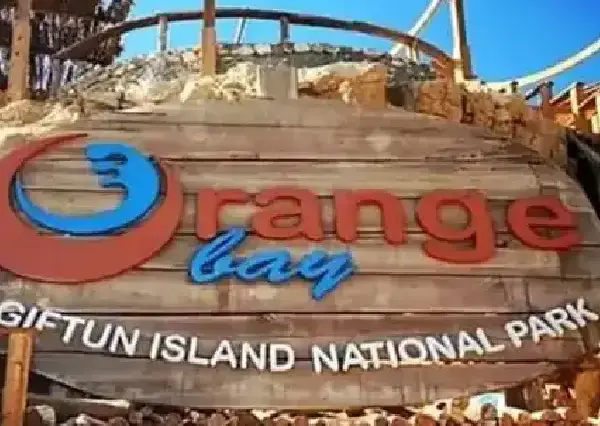 The stunning wooden swings and turquoise water of Orange Bay Island