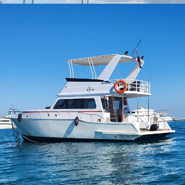 A luxury private boat cruising the turquoise waters of the Red Sea in Hurghada.