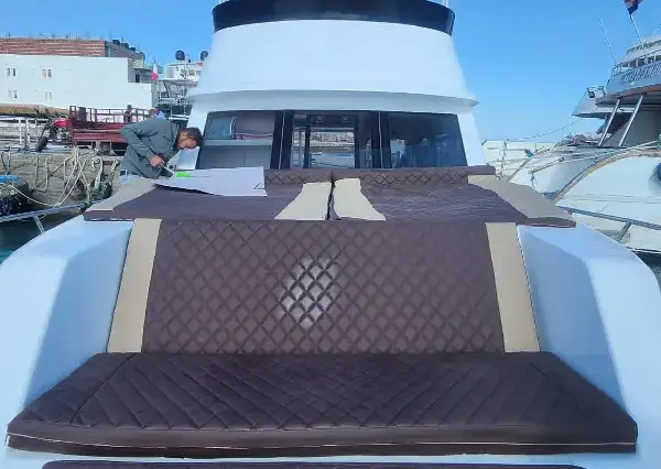 relaxing and sunbathing on the boat deck.