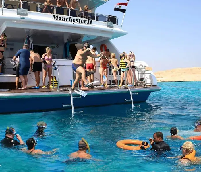 Overcrowded public commercial boat trip in Hurghada Red Sea