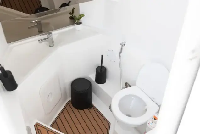 Clean and fully equipped onboard restroom inside a private speedboat in Hurghada.