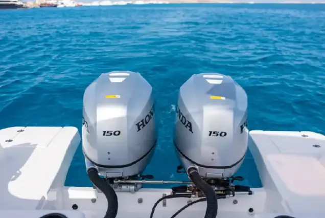 Close-up view of the dual 150 HP Honda outboard engines on Thunder Speed 1 speedboat