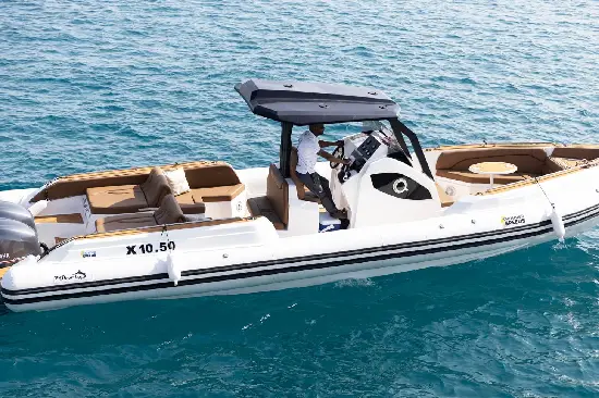 Large luxury private speedboat with shaded seating area in Hurghada Red Sea